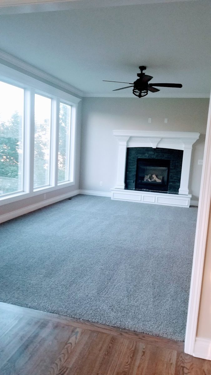 Freshly cleaned living room with fireplace